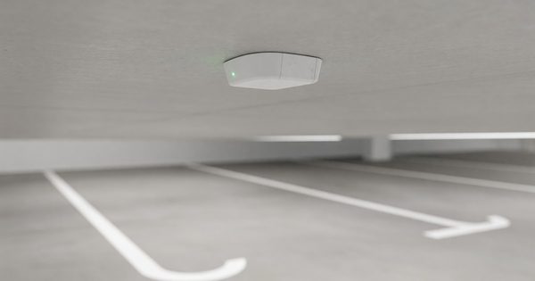 Hardware components of a parking guidance and information system including overhead sensors and LED indicators